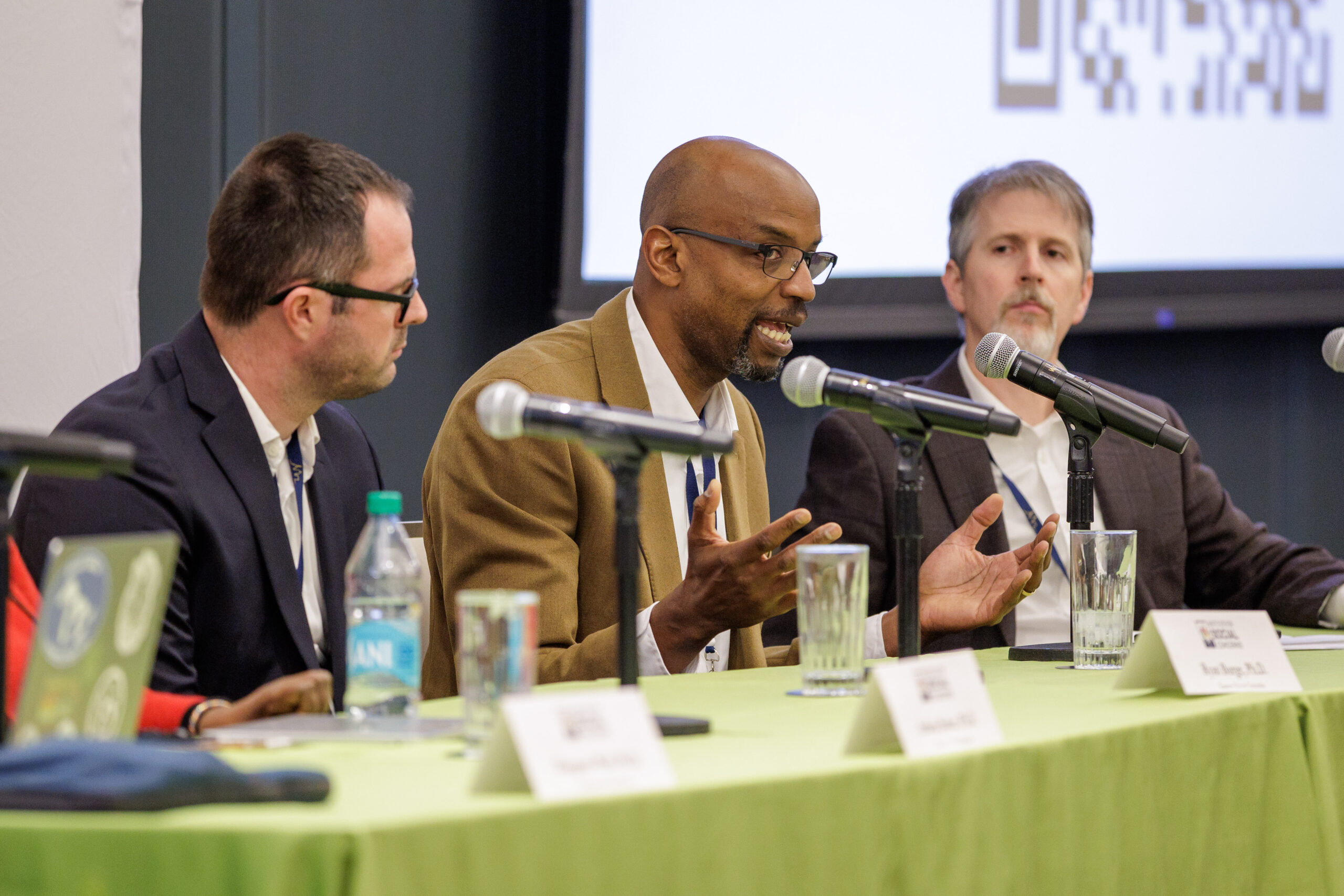 Ryan Burge, Reggie Williams, and Gary Adler on panel at CST 2025