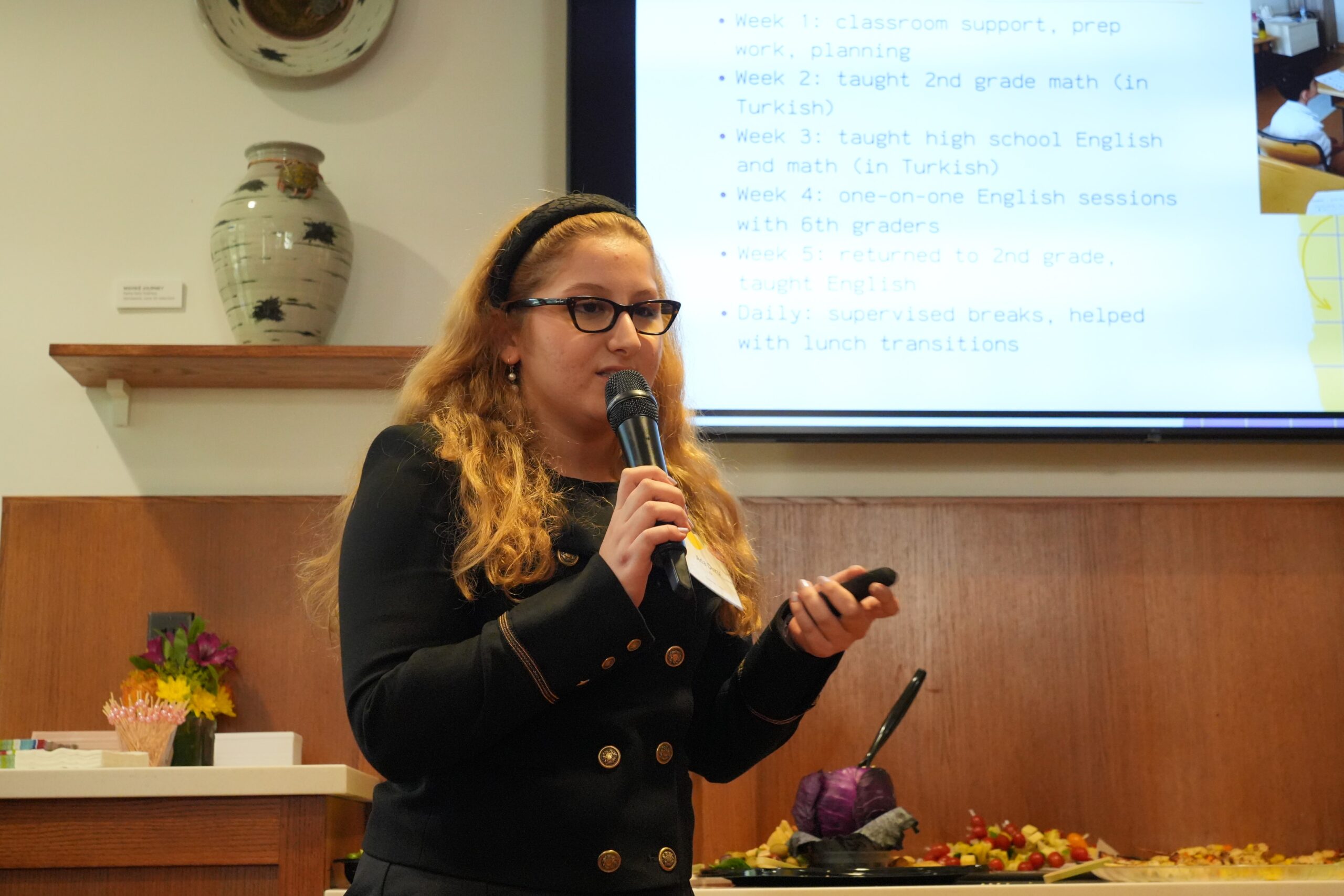 Ada Duru Ak presents her work at the RISE Hometown Symposium in the Geddes Hall Coffee House