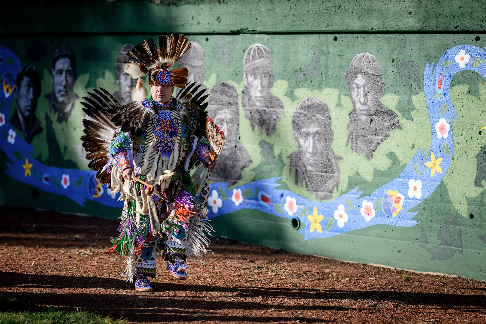 David Martin in Pokagon dress at Foundry Field mural